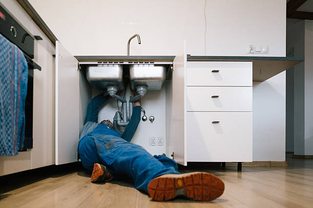 Professional Emergency Plumber technician working in Wilton, NH